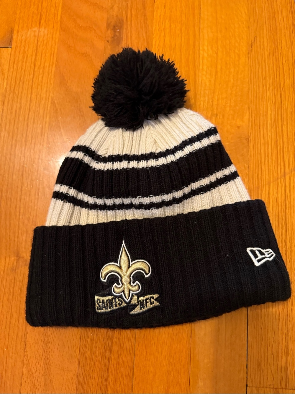 NFL Black & White Pom Beanie with Fleur-de-Lis Patch